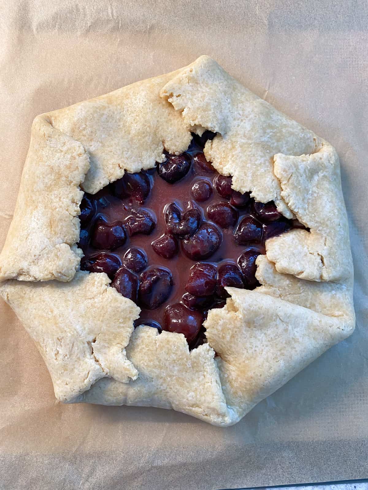 Pour extra liquid from the pot into the galette.