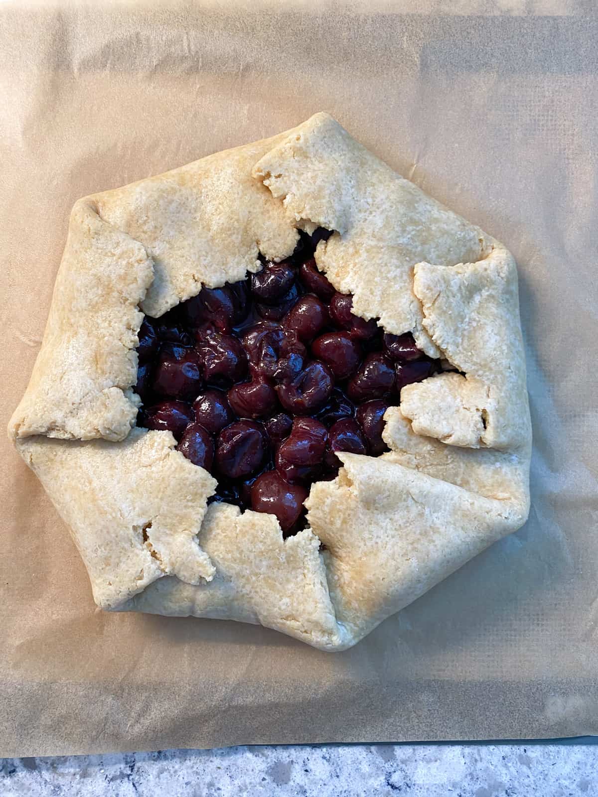 Edges of dough folded over the filling.