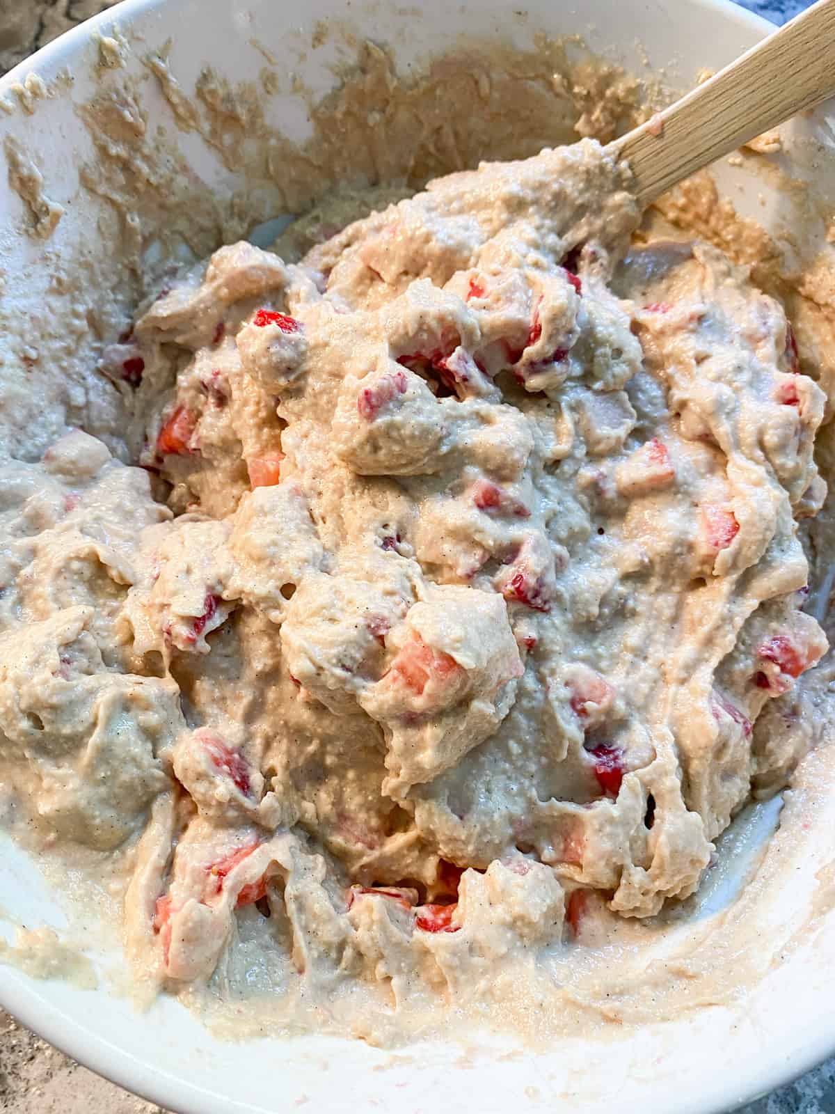 Diced strawberries folded into the muffin batter.