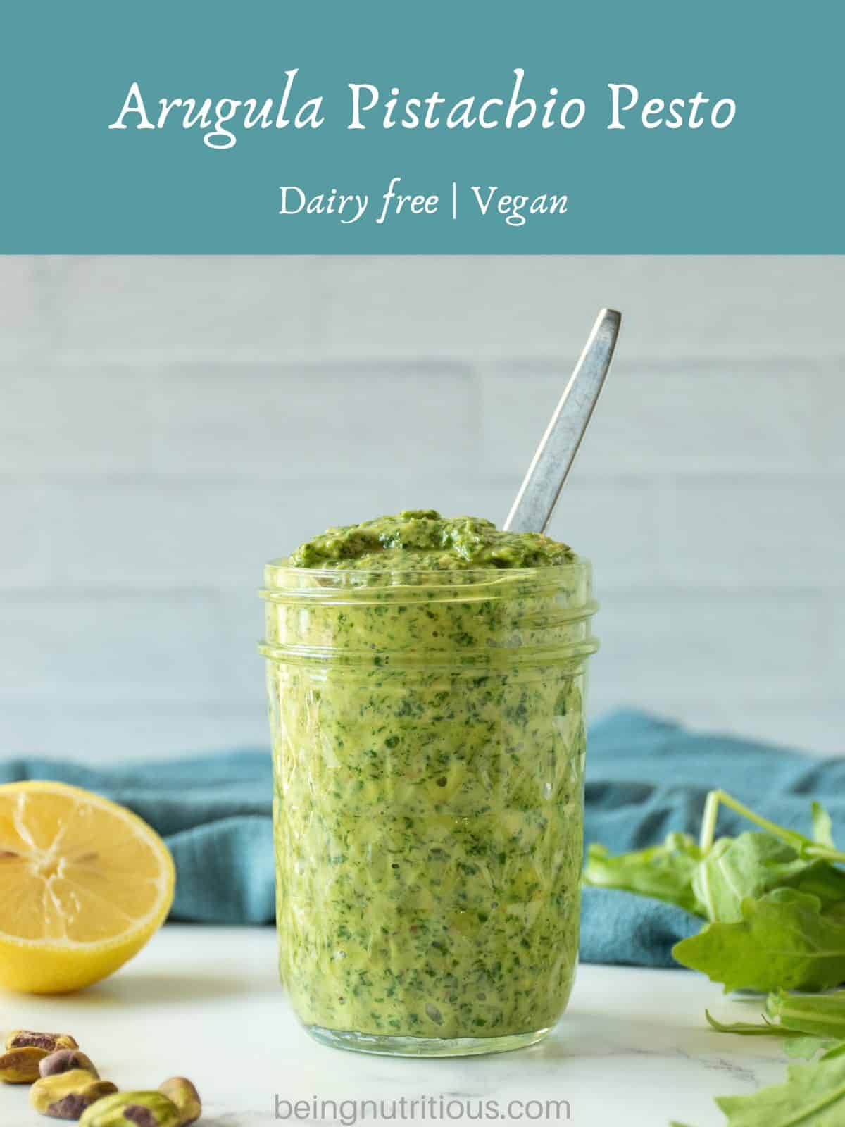 Pesto in a jar. Text overlay: Arugula Pistachio Pesto: Dairy free; vegan.