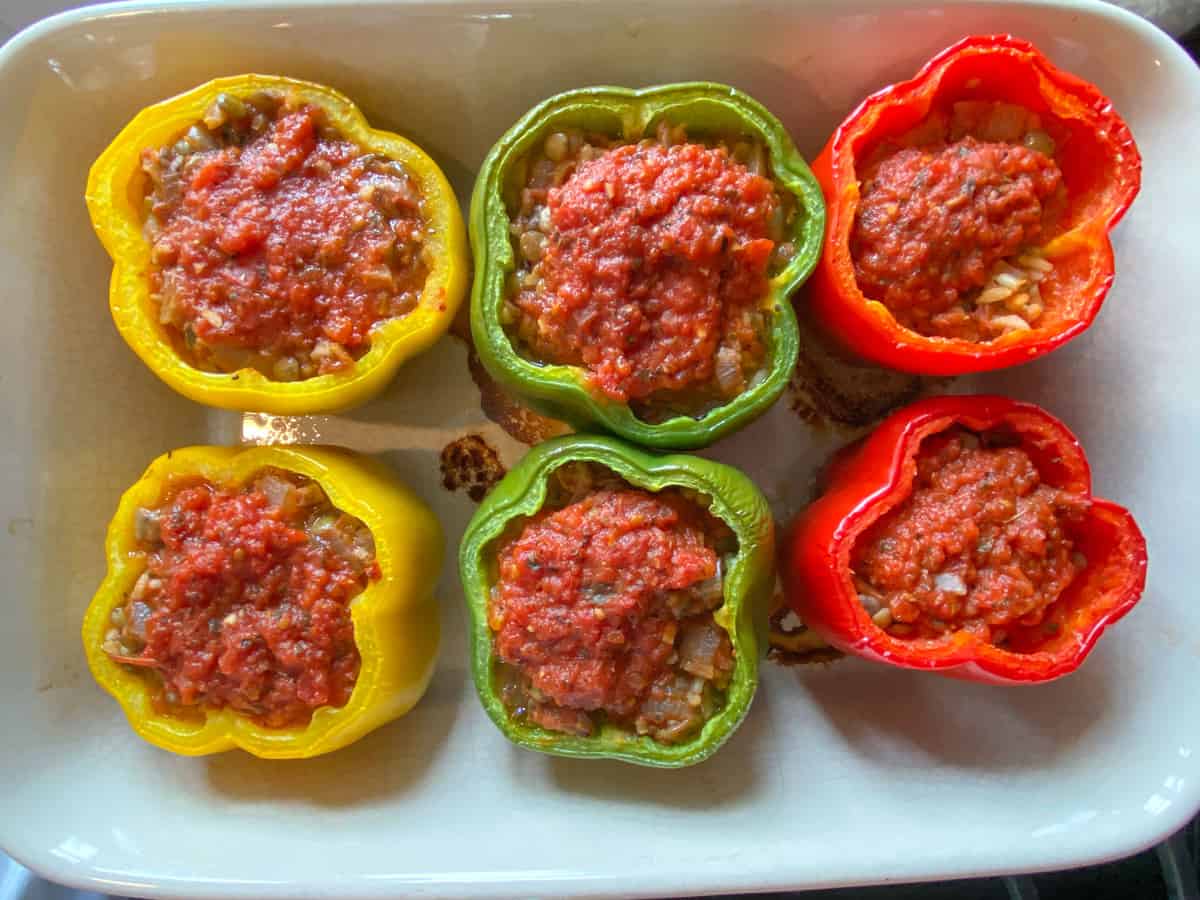 Pan of stuffed peppers after removal from oven.