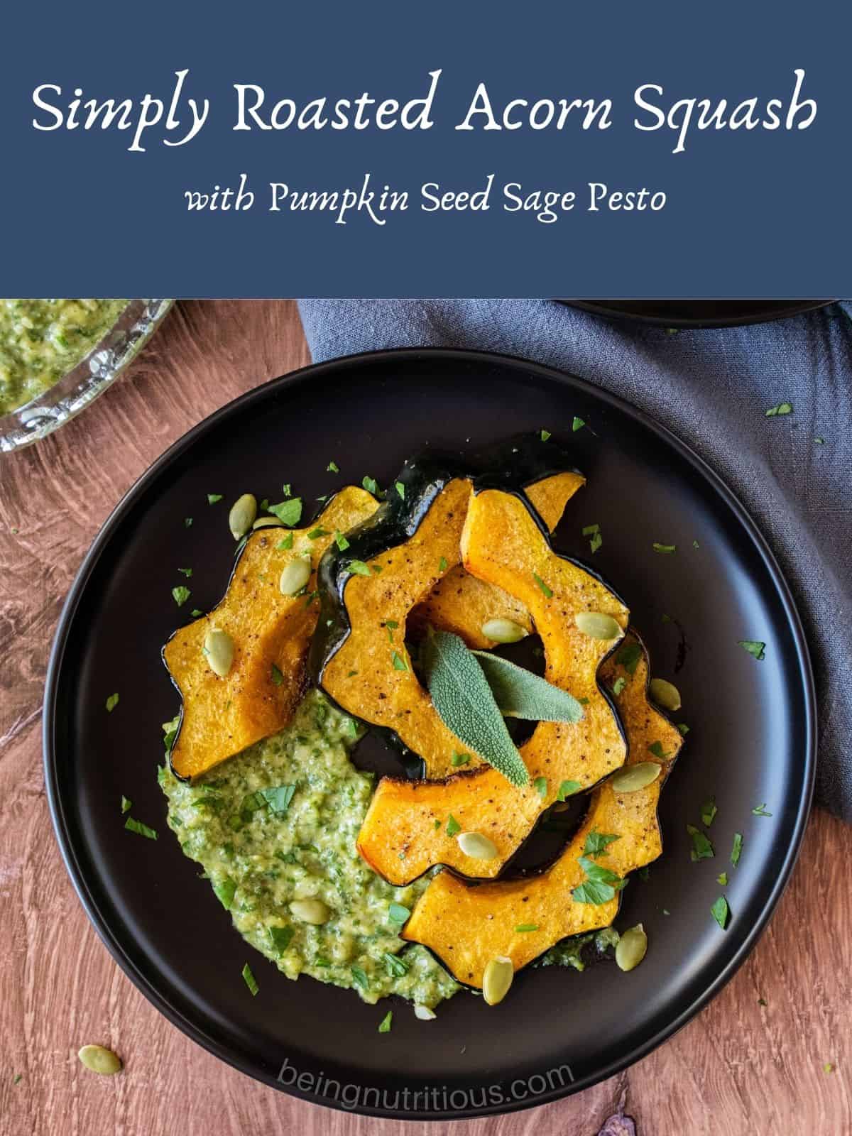 Slices of roasted acorn squash over sage pesto with pepitas. Text overlay: Simply roasted acorn squash with pumpkin seed sage pesto.