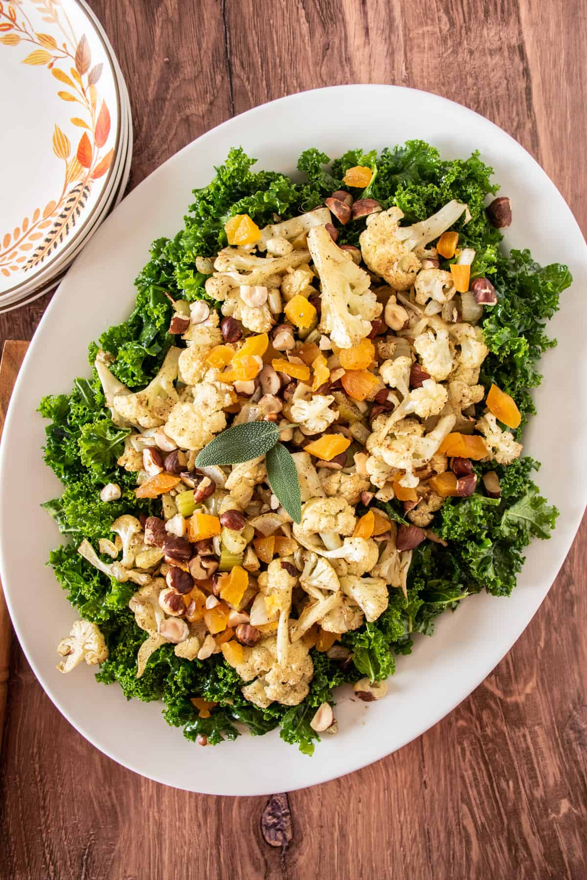 Overhead picture of kale cauliflower salad on a large serving platter.
