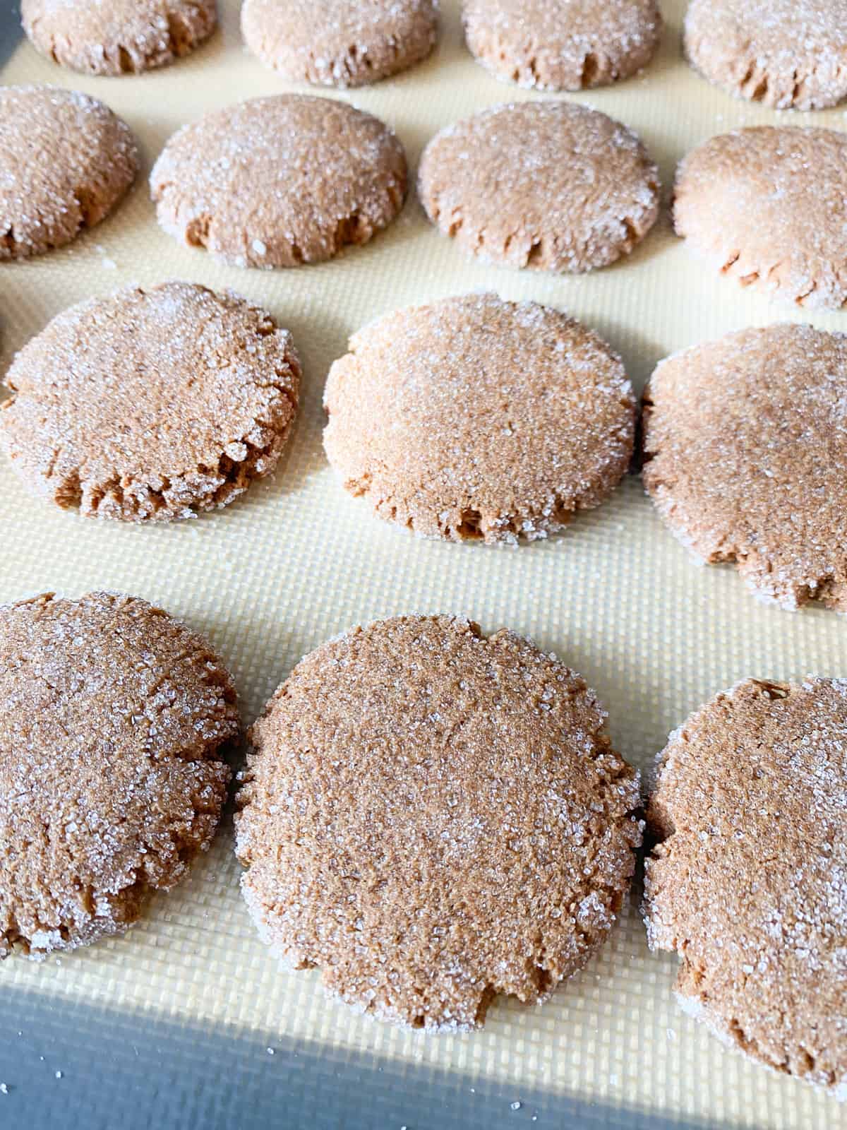Baked cookies on a cookie sheet.