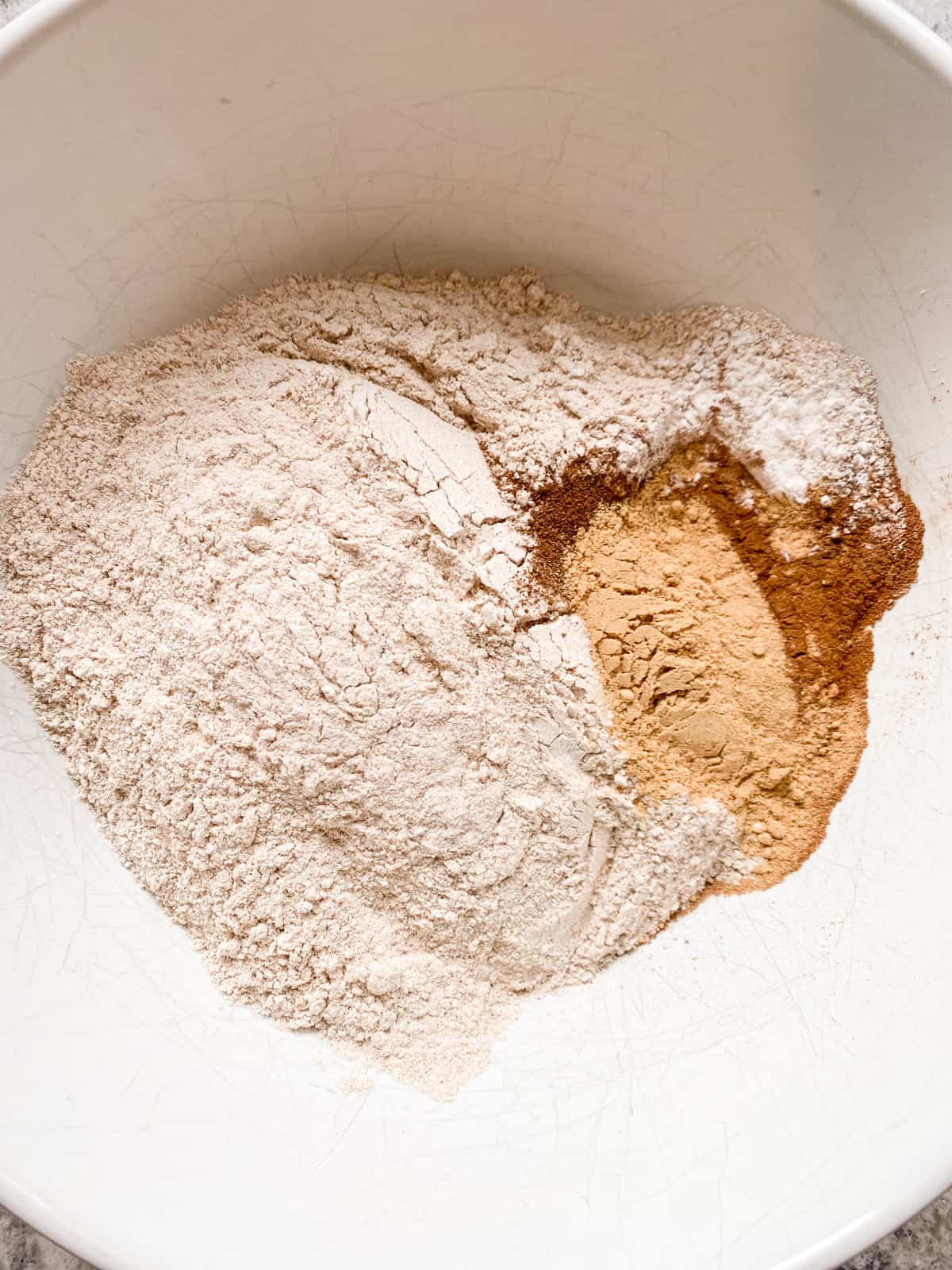 Dry cookie ingredients in a bowl.