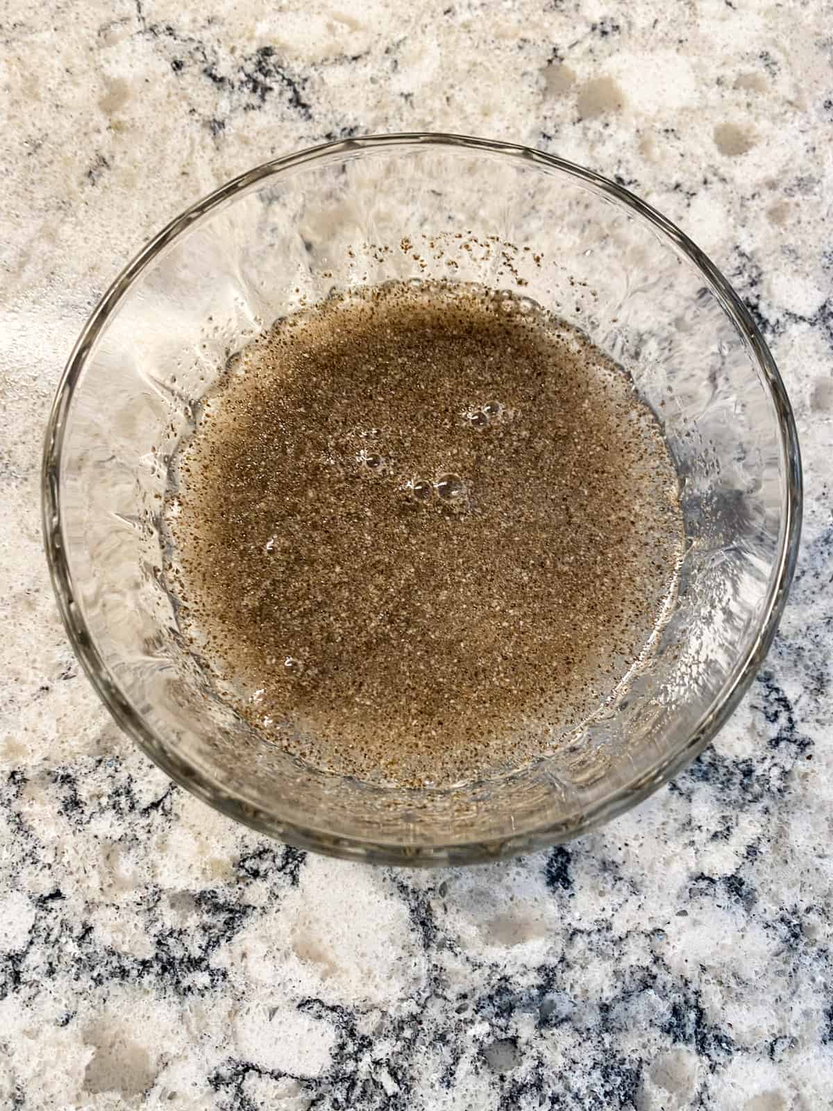 Water added to dry, ground, chia seeds.