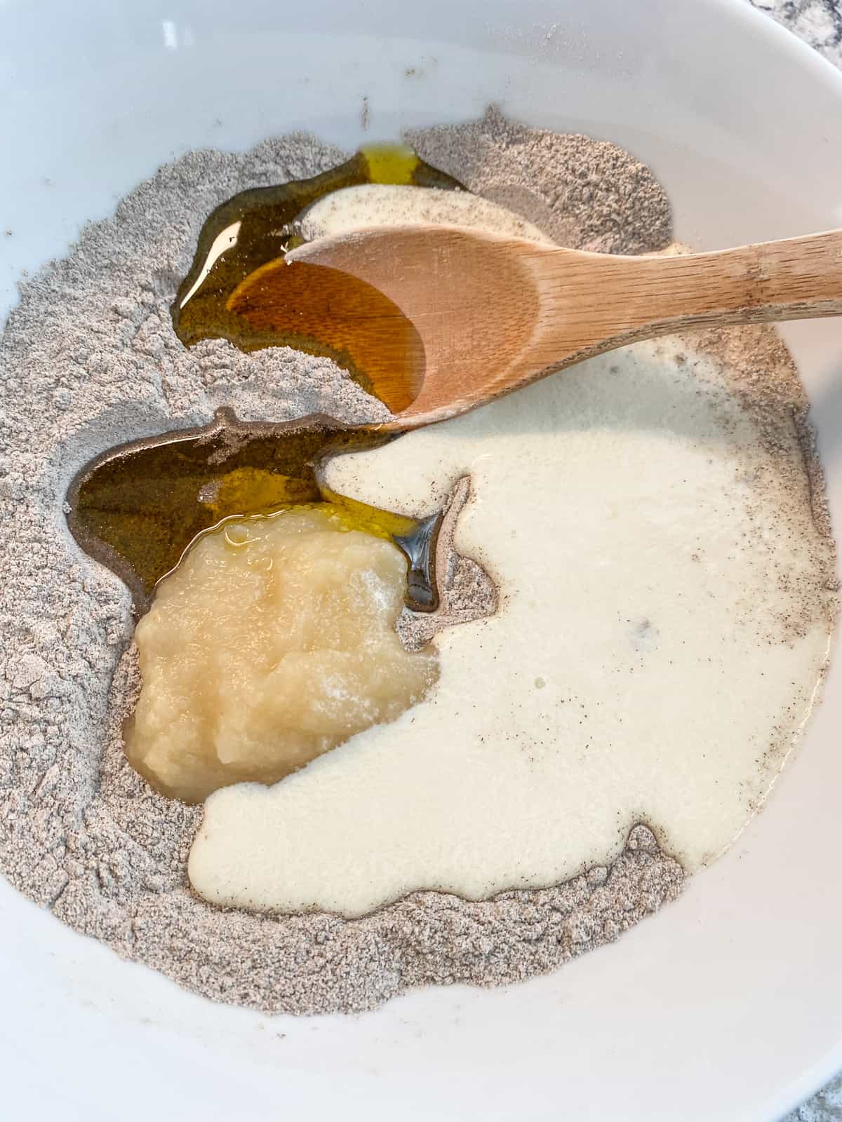 Wet ingredients added to the dry biscuit ingredients.