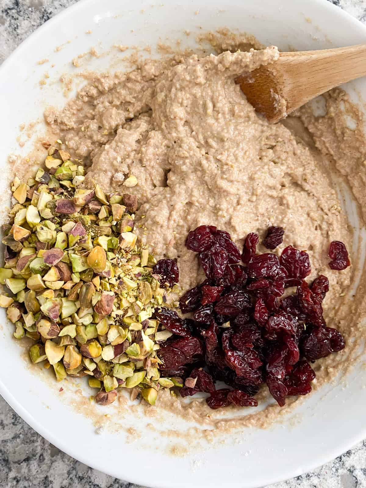 Dried cherries and chopped pistachios added to mixed cookie batter.