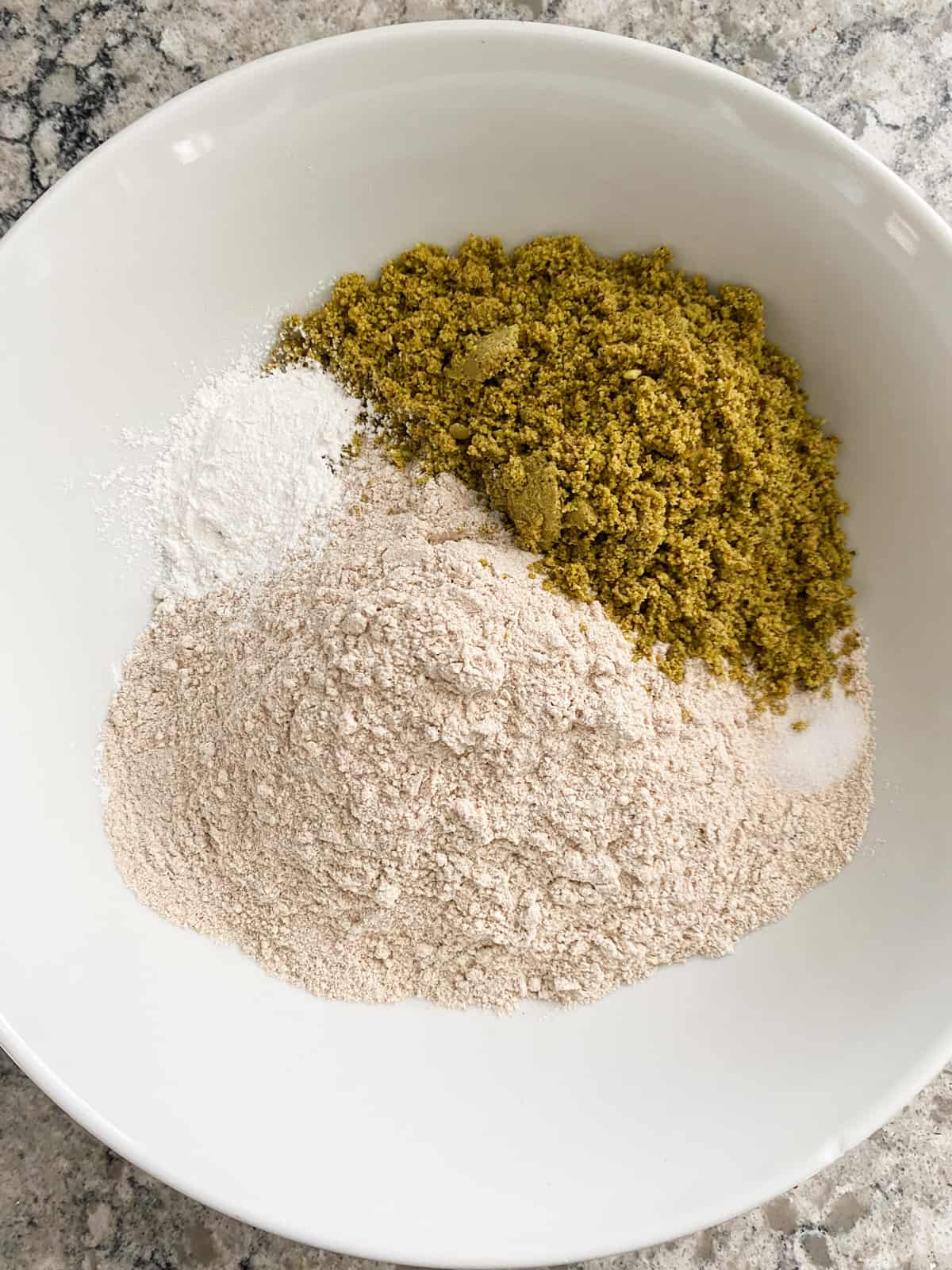Dry cookie ingredients in a large bowl.
