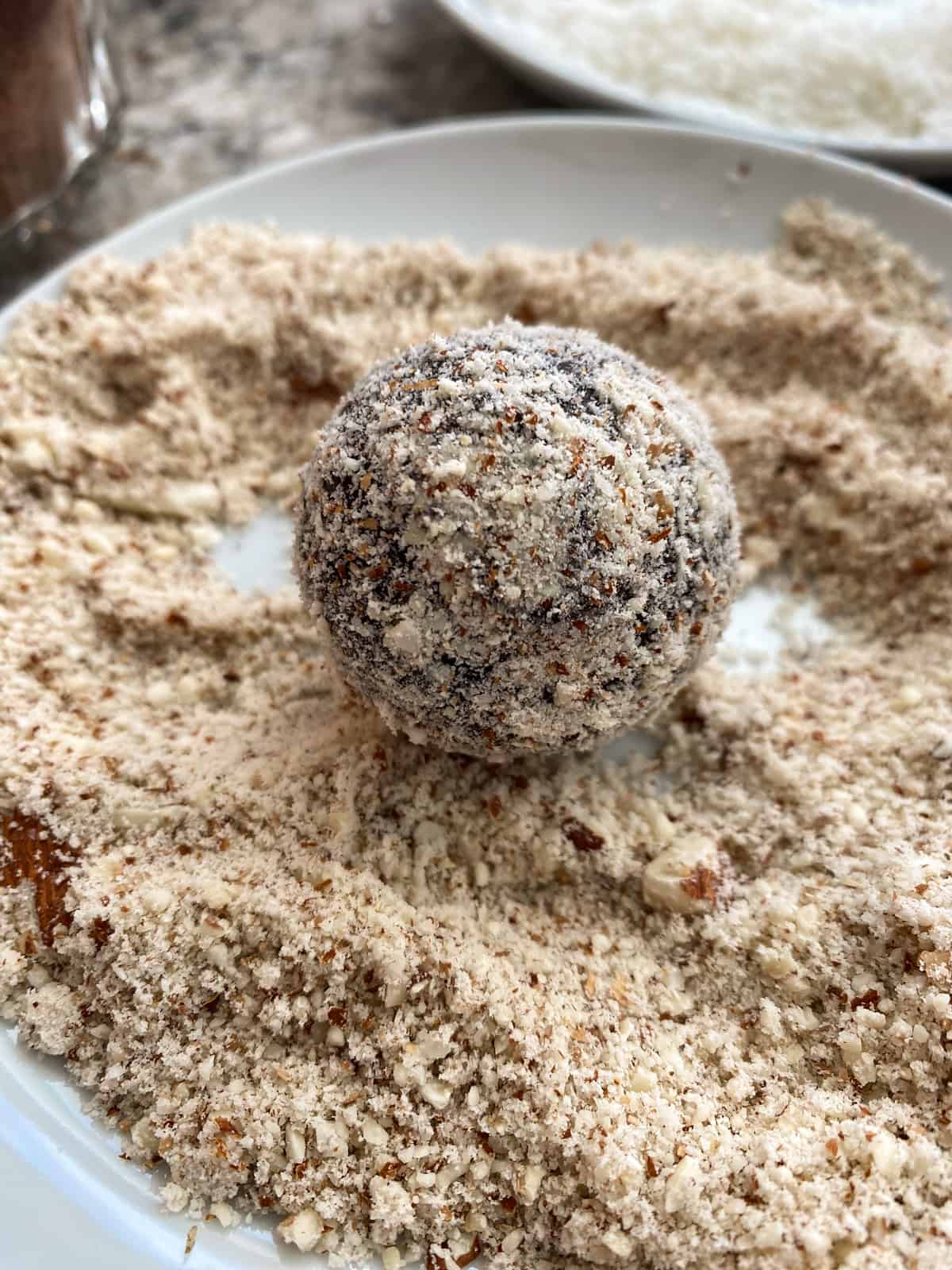 Cherry truffle rolled in ground almonds.
