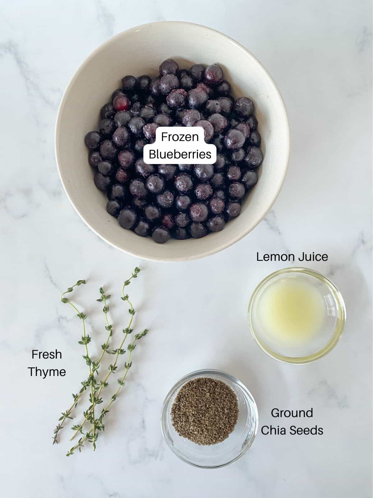 Ingredients for blueberry chia jam with thyme.