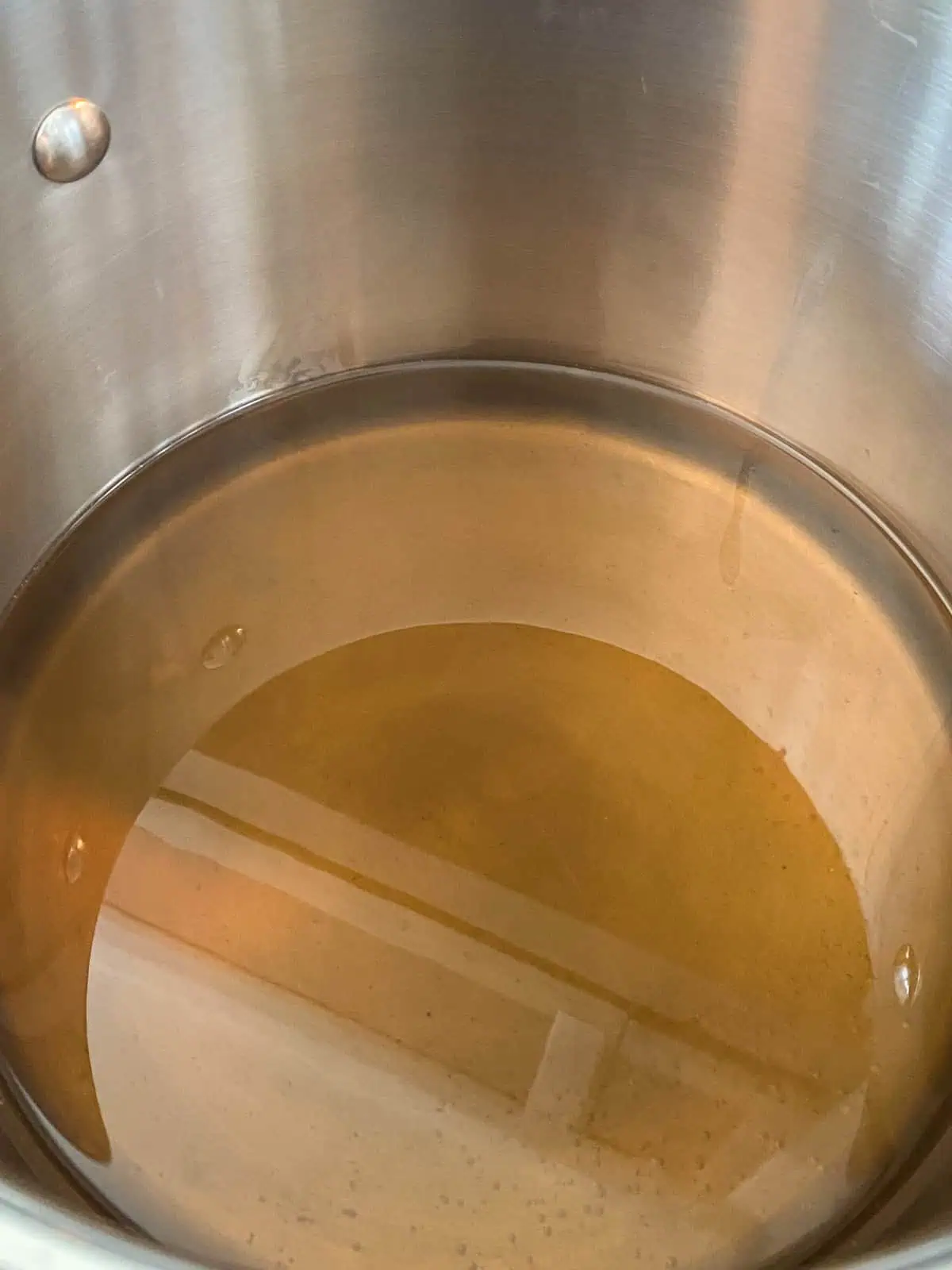 Vegetable stock in a large pot.