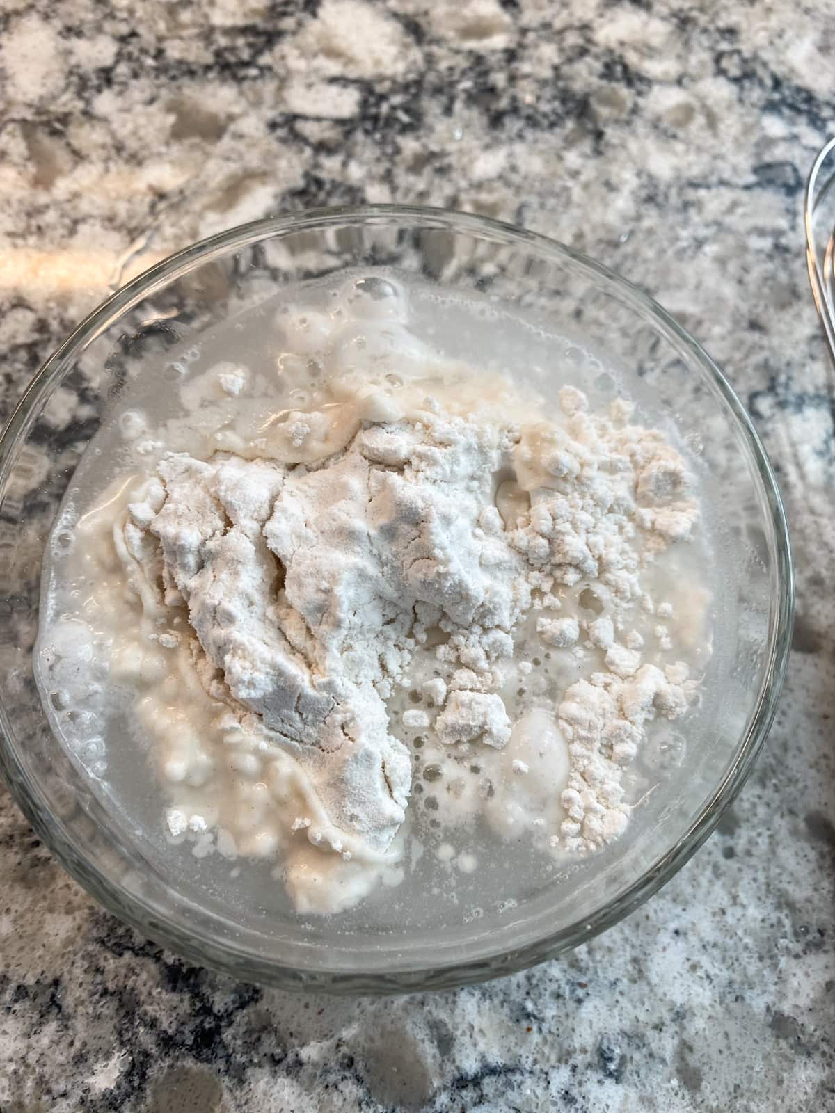 Small bowl with cold water and flour in it, for thickening stew.