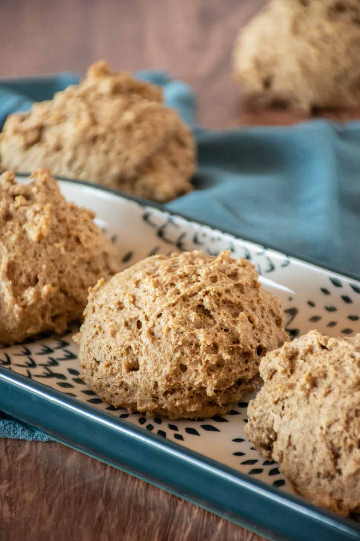 Whole wheat drop biscuits on a serving tray.