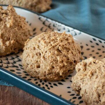 Whole wheat drop biscuits on a serving tray.