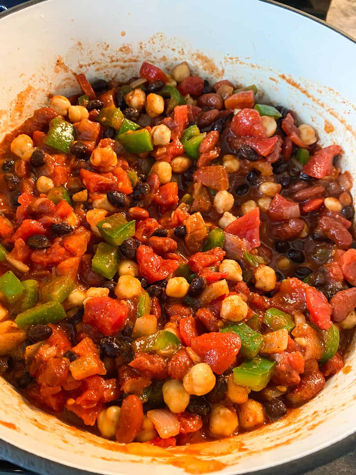 Pot with all the chili ingredients added, and combined; ready to cook down.