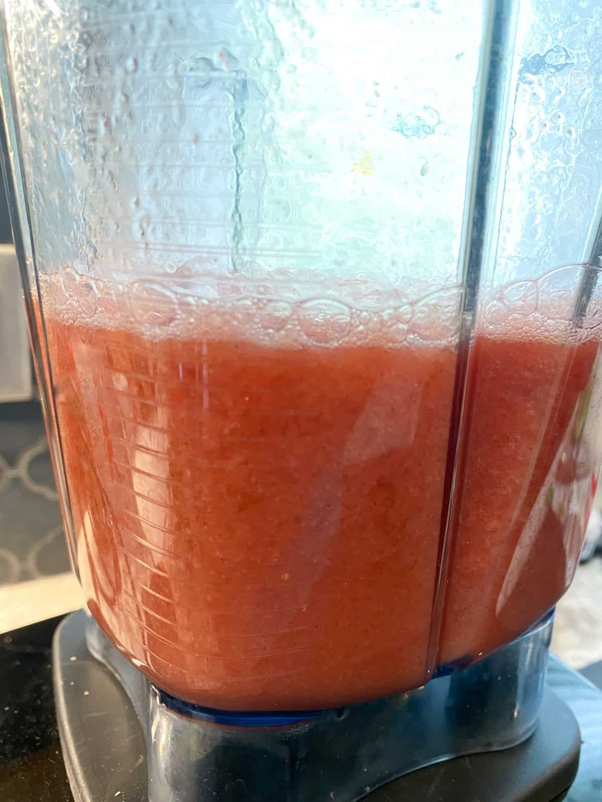 Strawberry watermelon agua fresca in a blender.