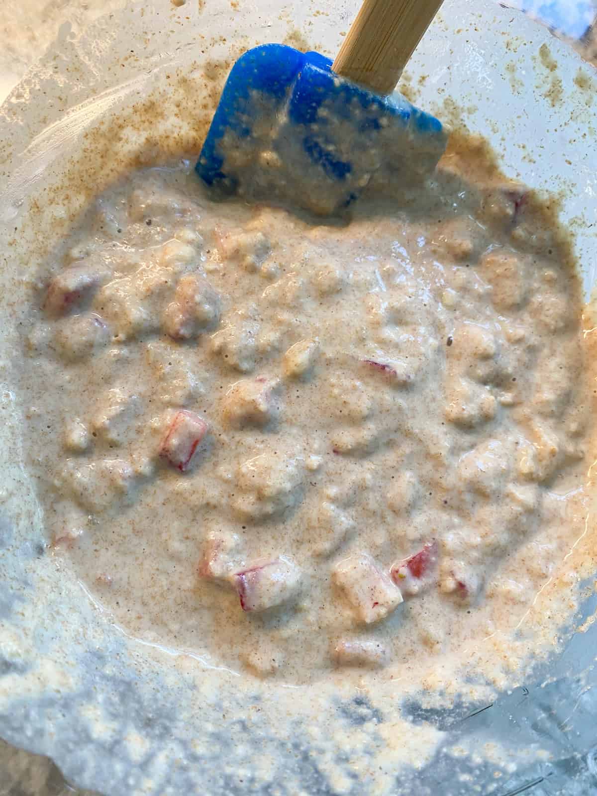Strawberries folded into batter.