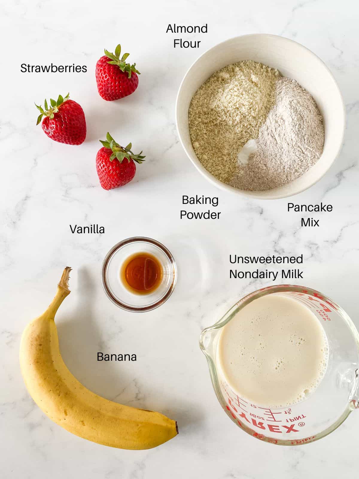 Ingredients for strawberry banana pancakes.