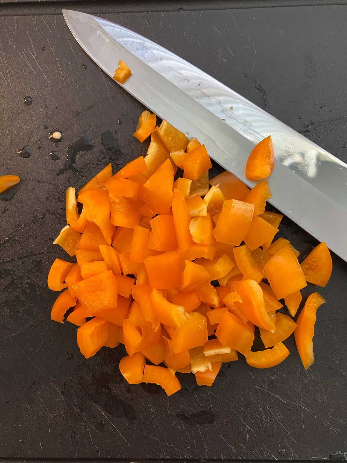 Chopped orange bell peppers.