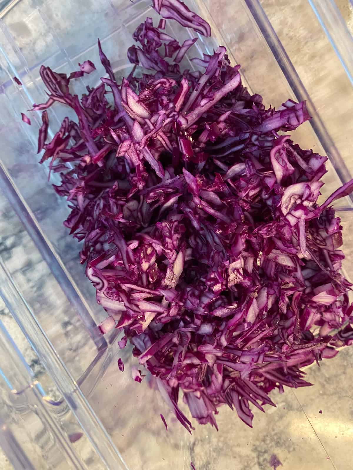 Finely shredded purple cabbage.
