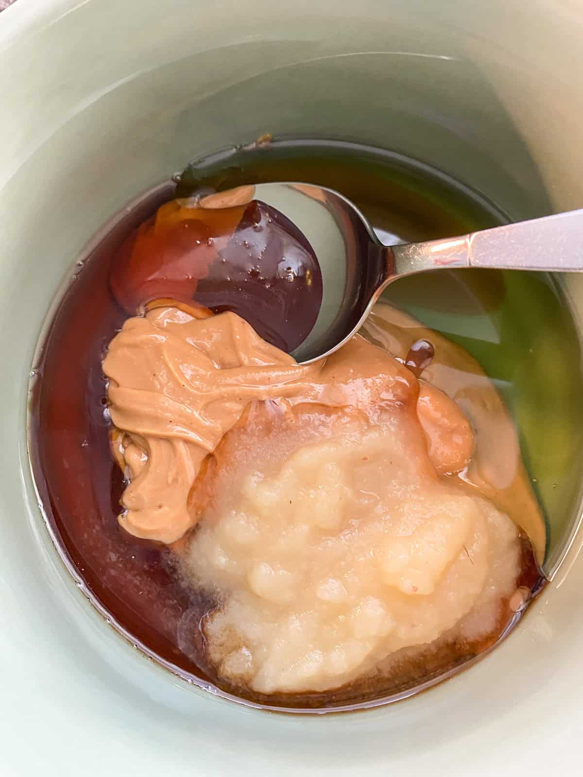 Wet cookie ingredients, in a bowl.