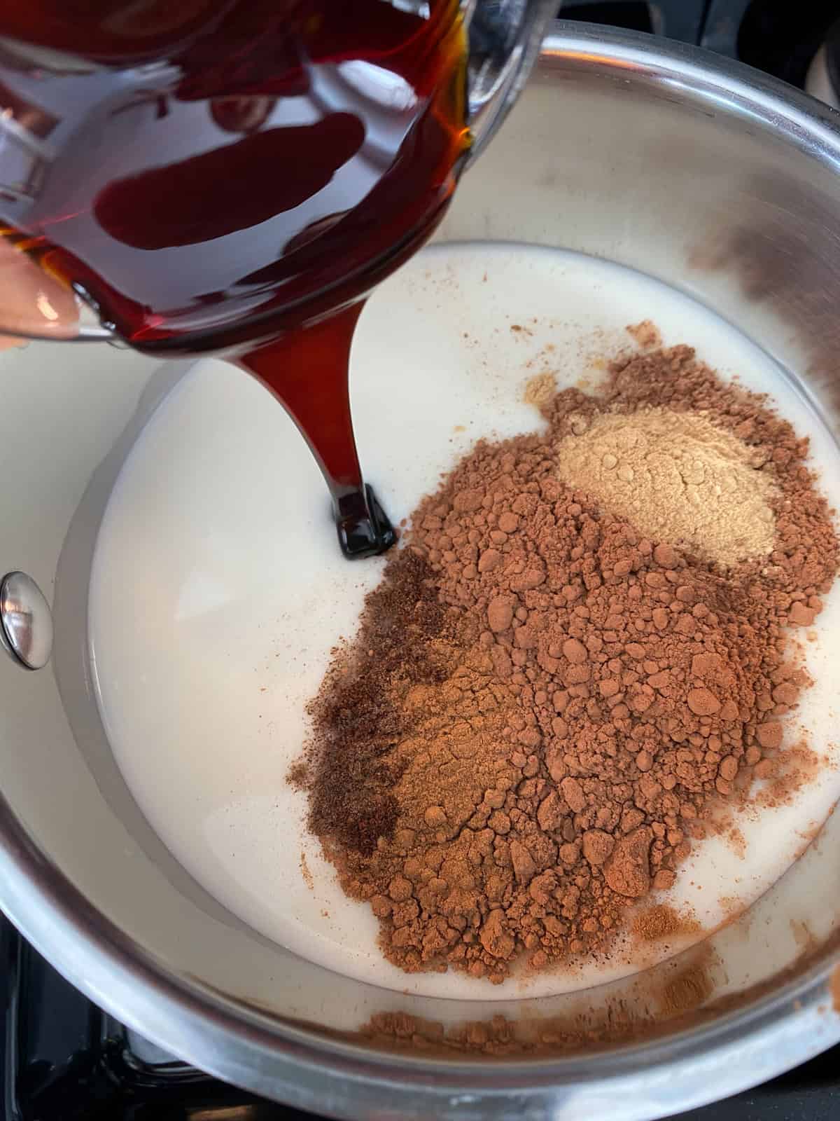 Hot cocoa ingredients in a saucepan.