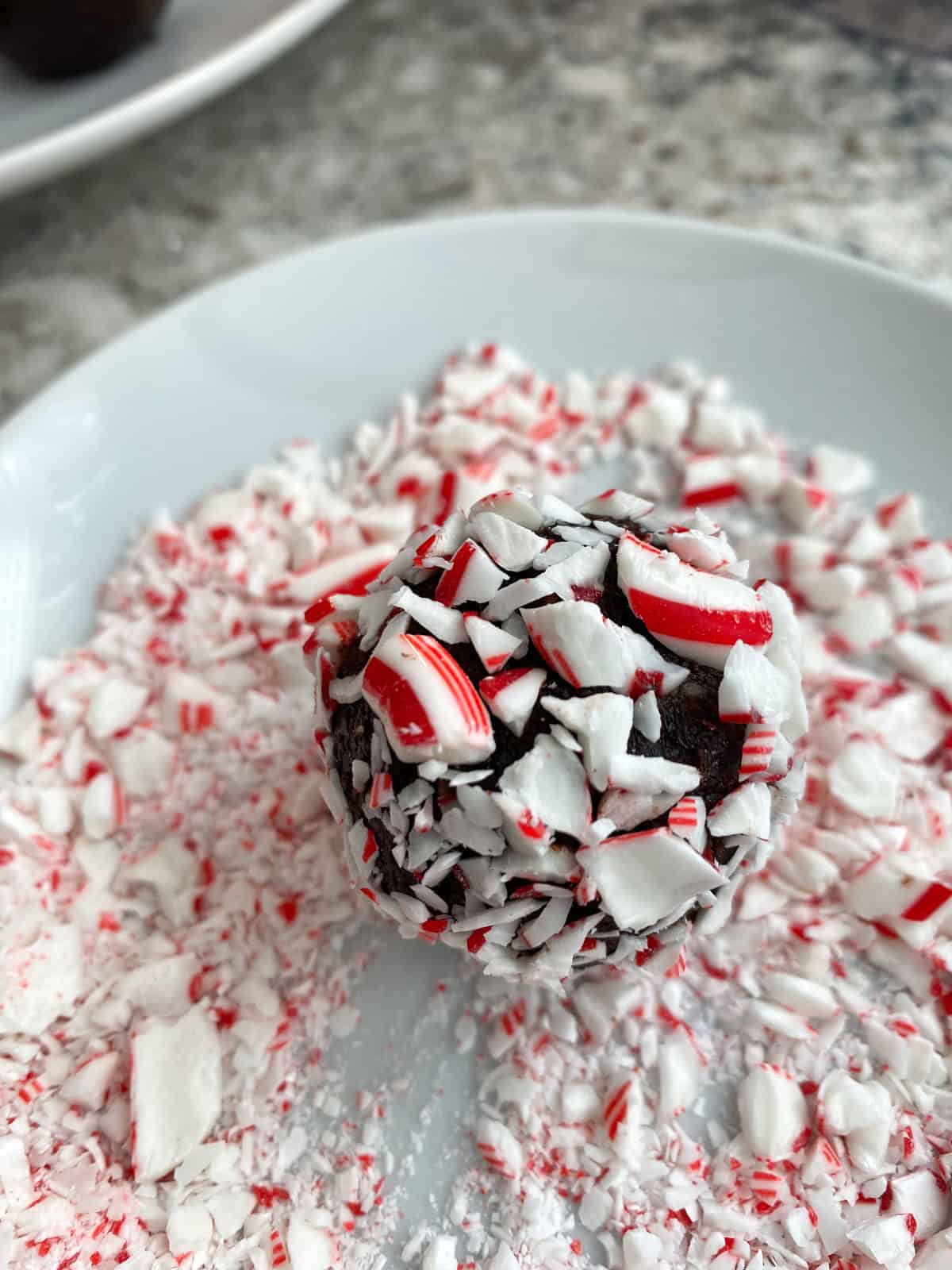 Date ball rolled in crushed candy canes.