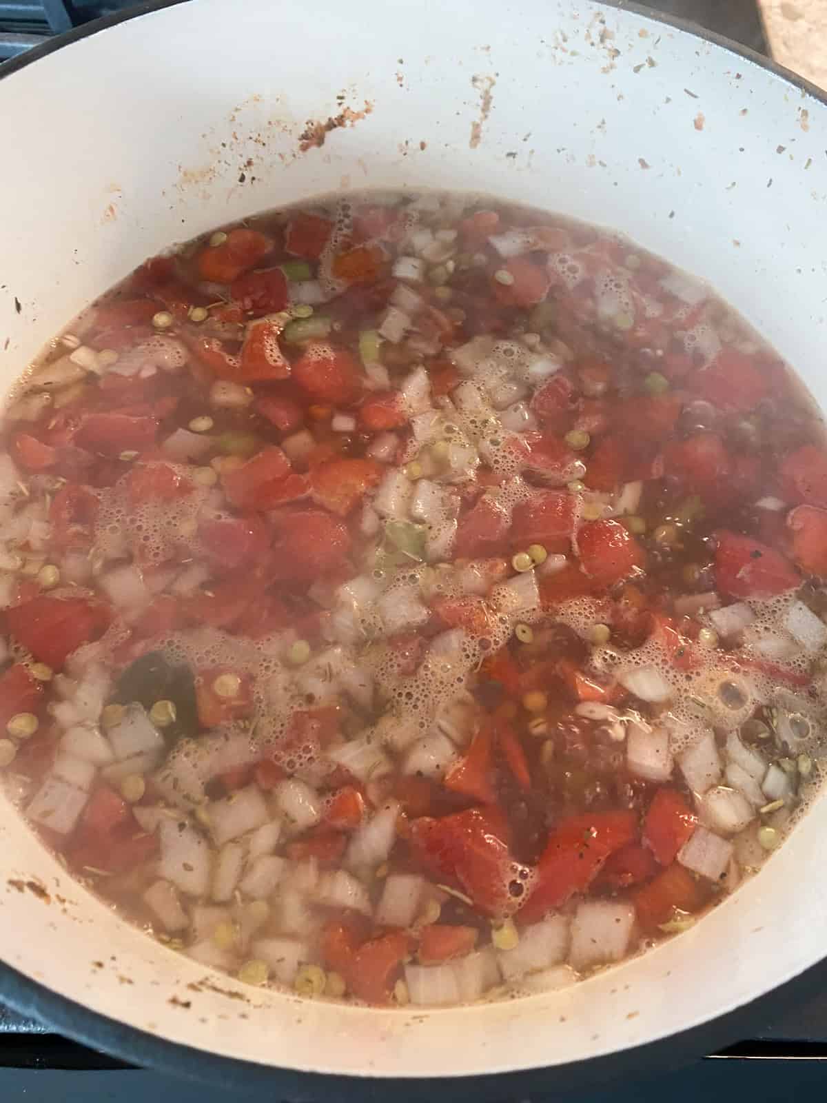 Boiling soup in a Dutch oven.