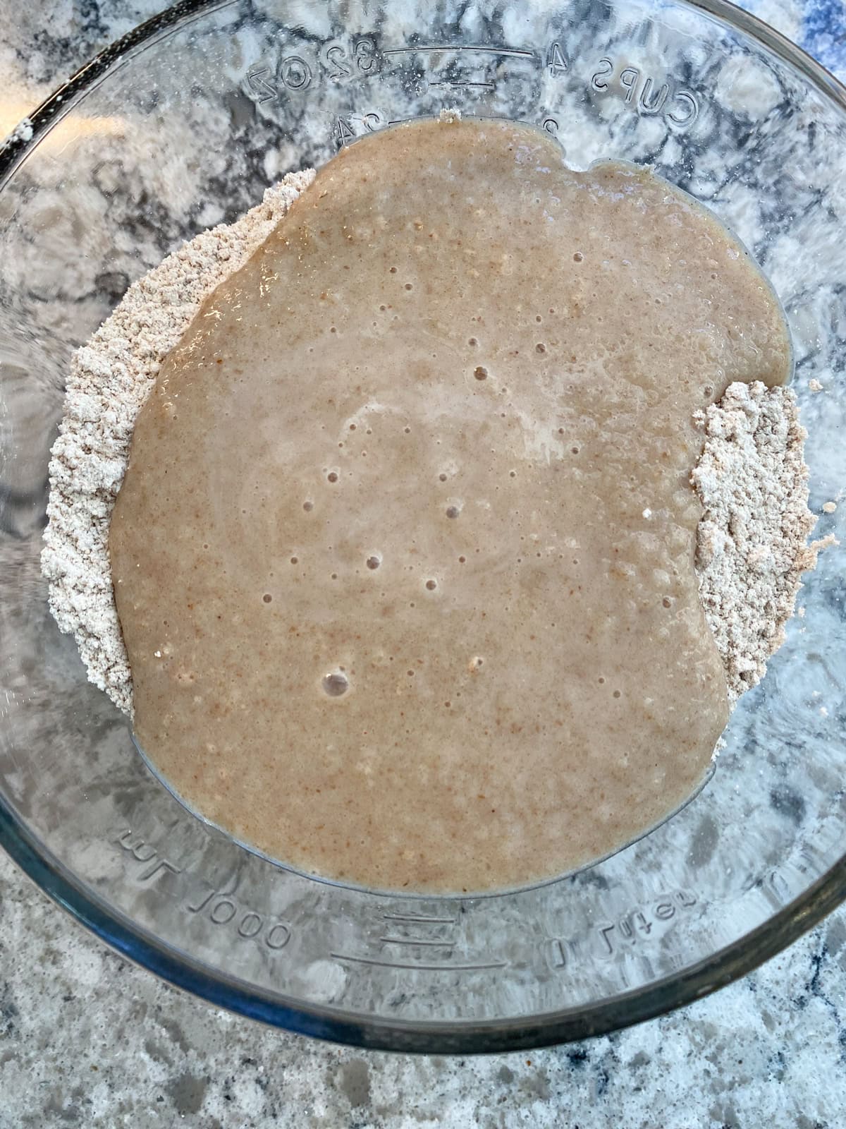 Wet ingredients poured into dry ingredients.