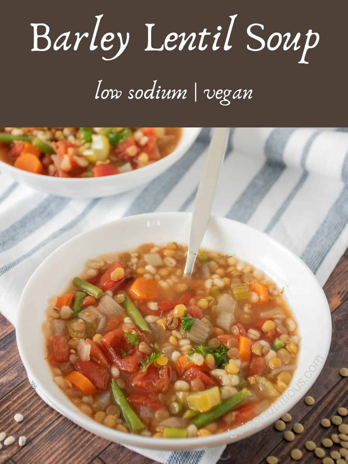 Bowl of soup with a spoon in it. Text overlay: Barley Lentil Soup; low sodium, vegan.