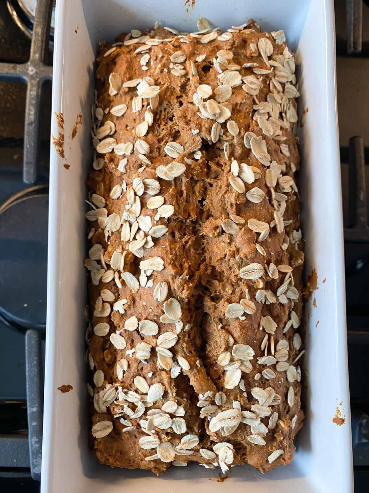 Baked bread, in a loaf pan.