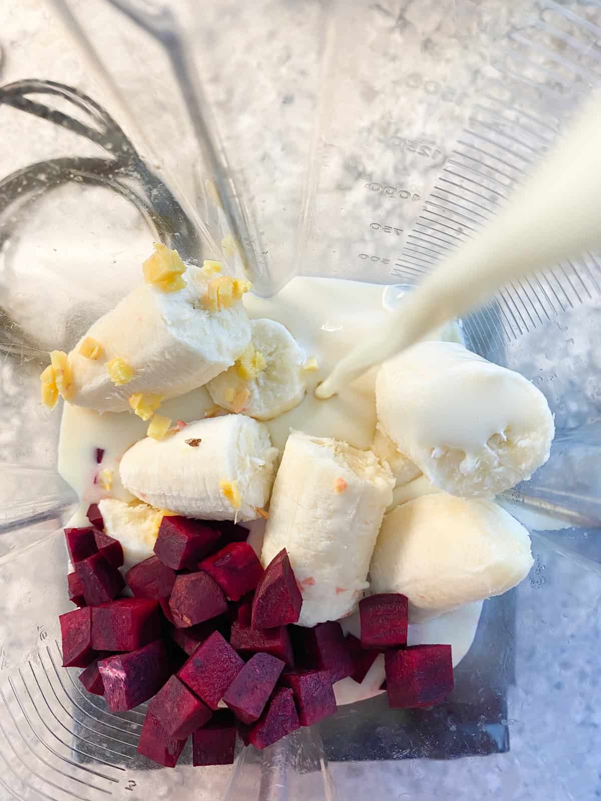 Smoothie ingredients in a blender.