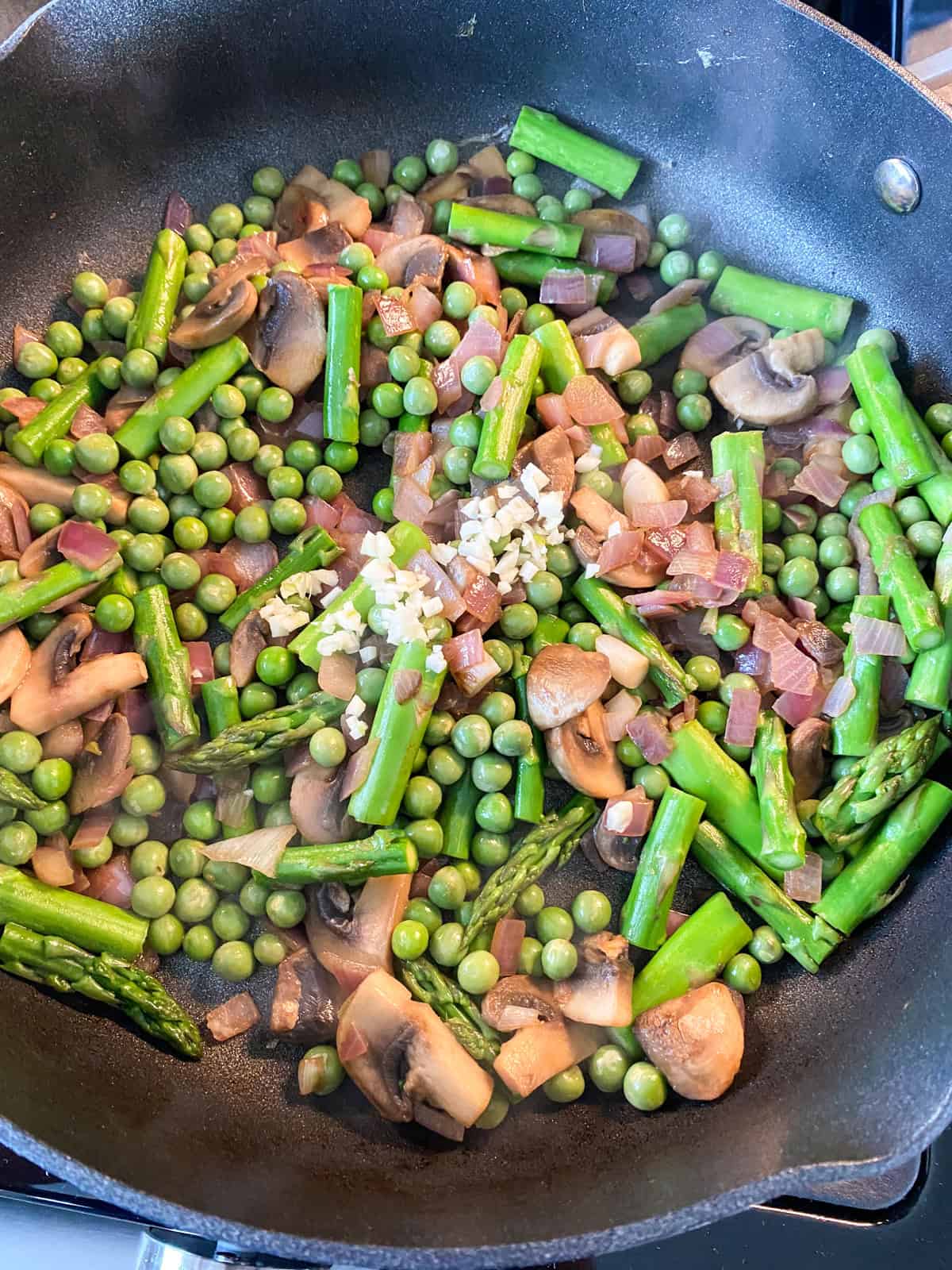 Garlic added to the skillet.