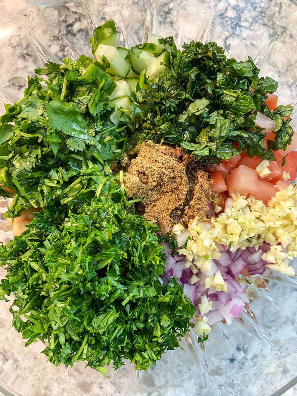 Dried spices added to the salad.