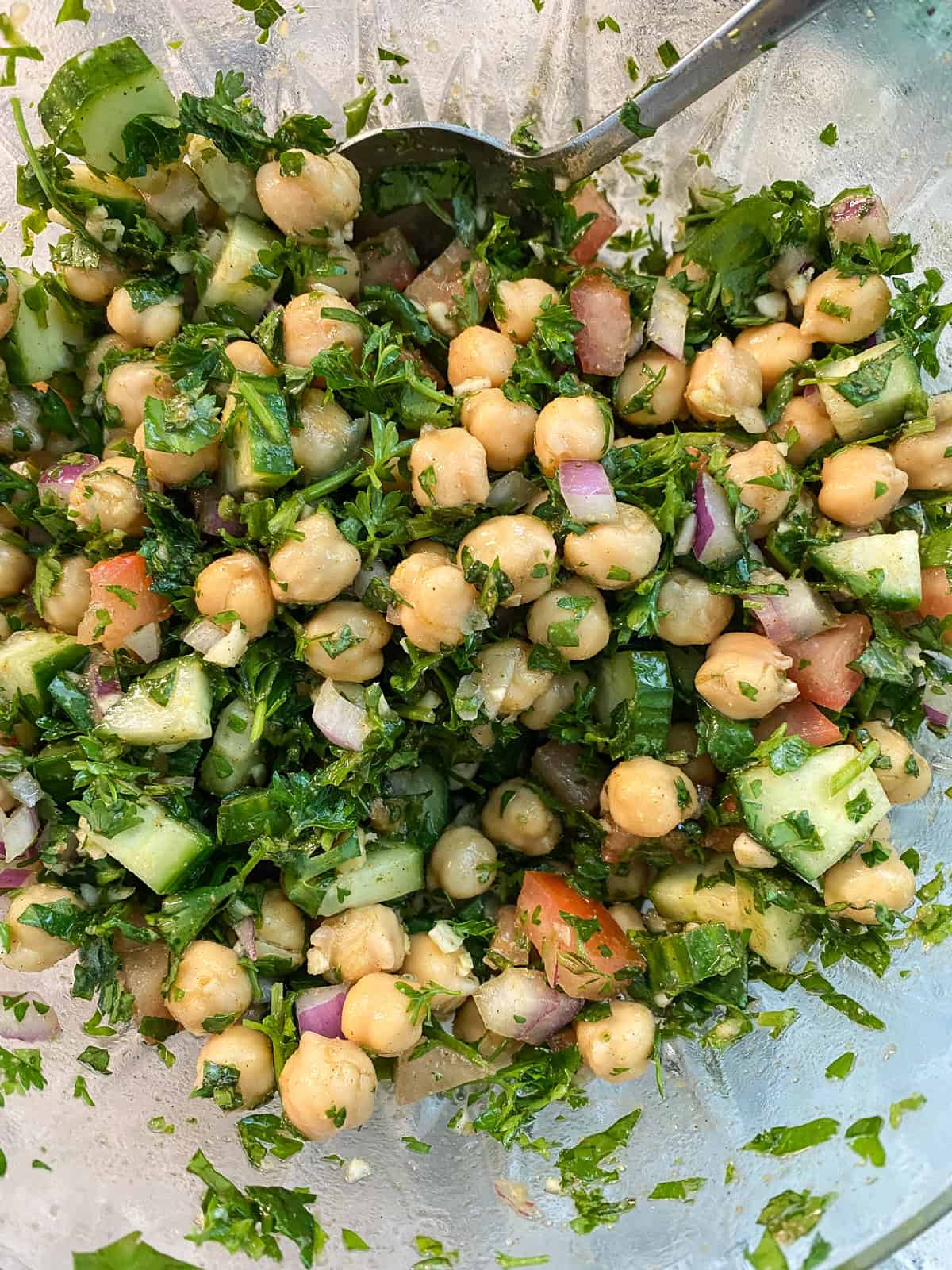 Chickpea salad filling, mixed, in a bowl.