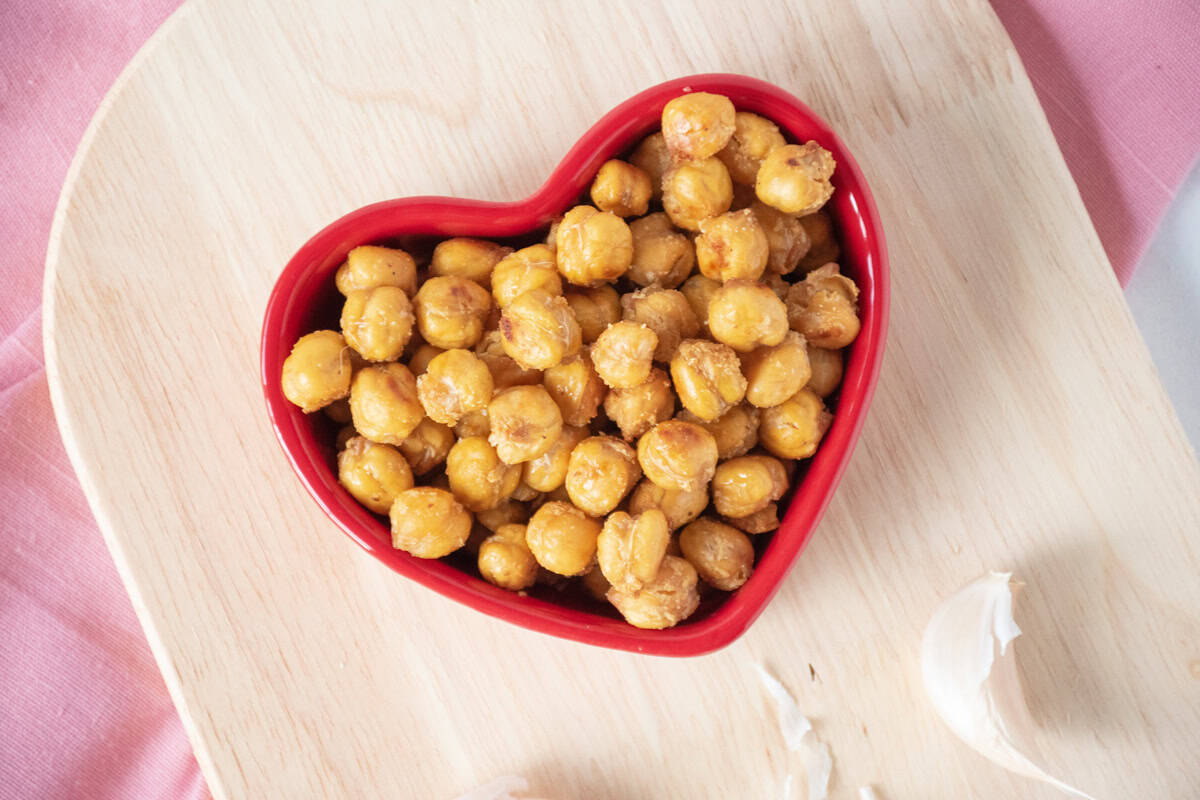 Crispy chickpeas in a heart shaped bowl.
