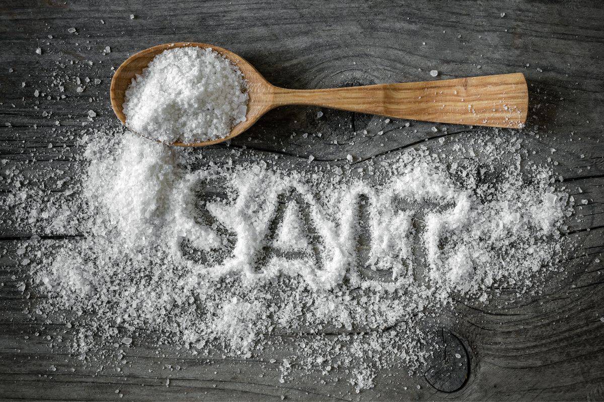 Salt on a table, with the word SALT spelled in it.