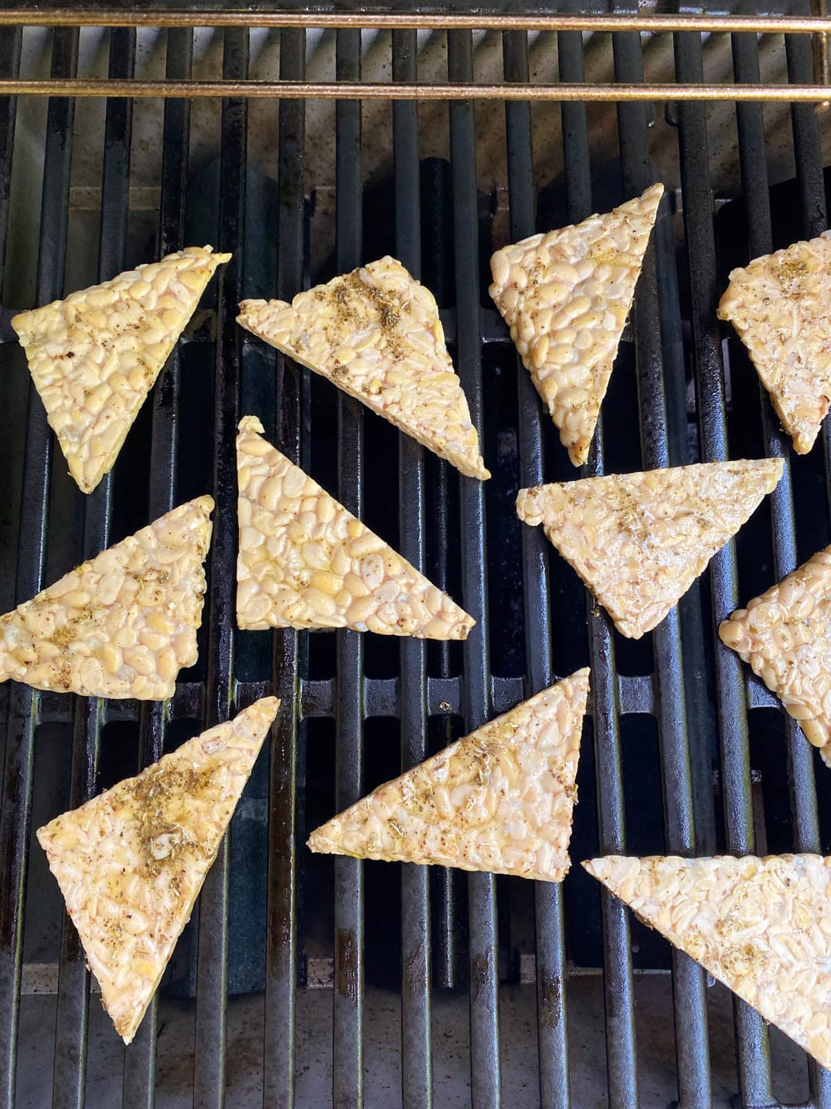 Tempeh being grilled.