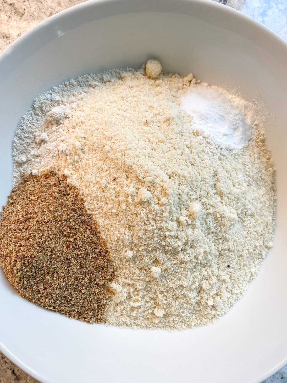 All the dry ingredients in a bowl before mixing.