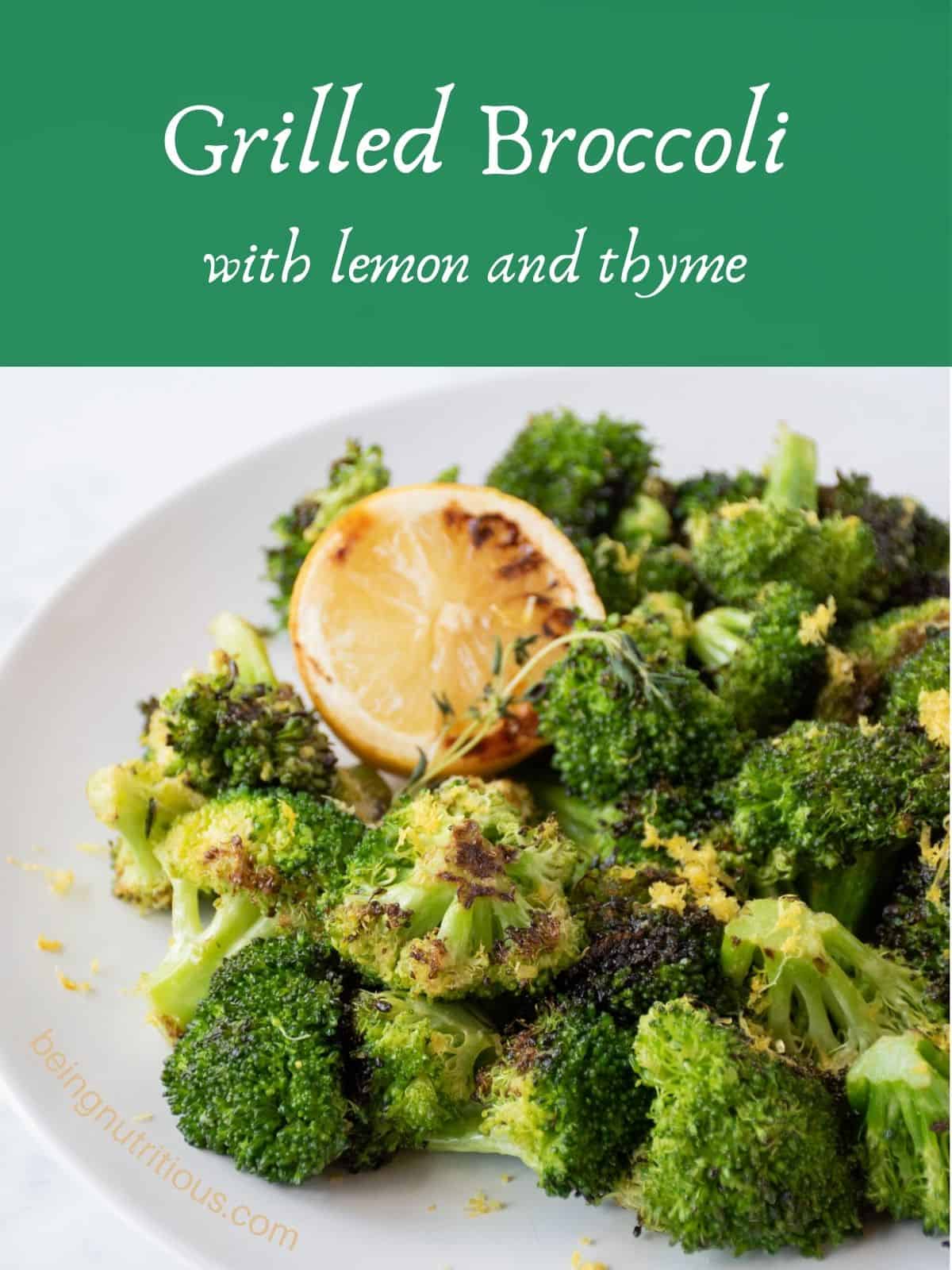 Grilled broccoli on a serving plate, garnished with lemon zest and a stem of thyme. Text overlay: Grilled Broccoli with lemon and thyme.