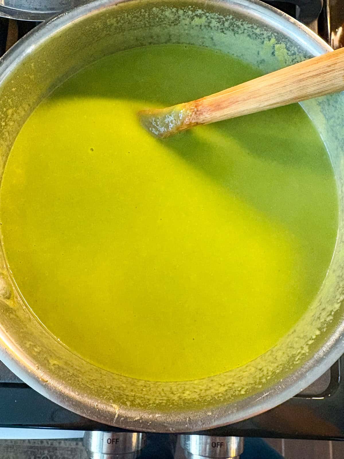 Finished green tomato soup, in a pot.
