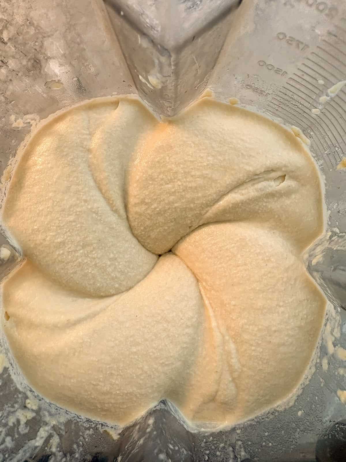 Ingredients blended into hummus.