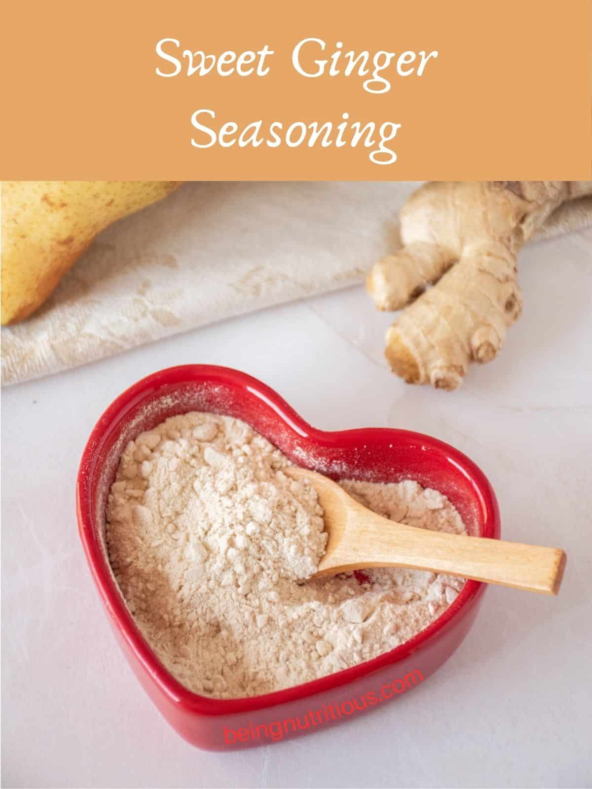 Seasoning powder made from pears and ginger, in a red heart shaped dish with a small wooden spoon. Text overlay: Sweet Ginger Seasoning.