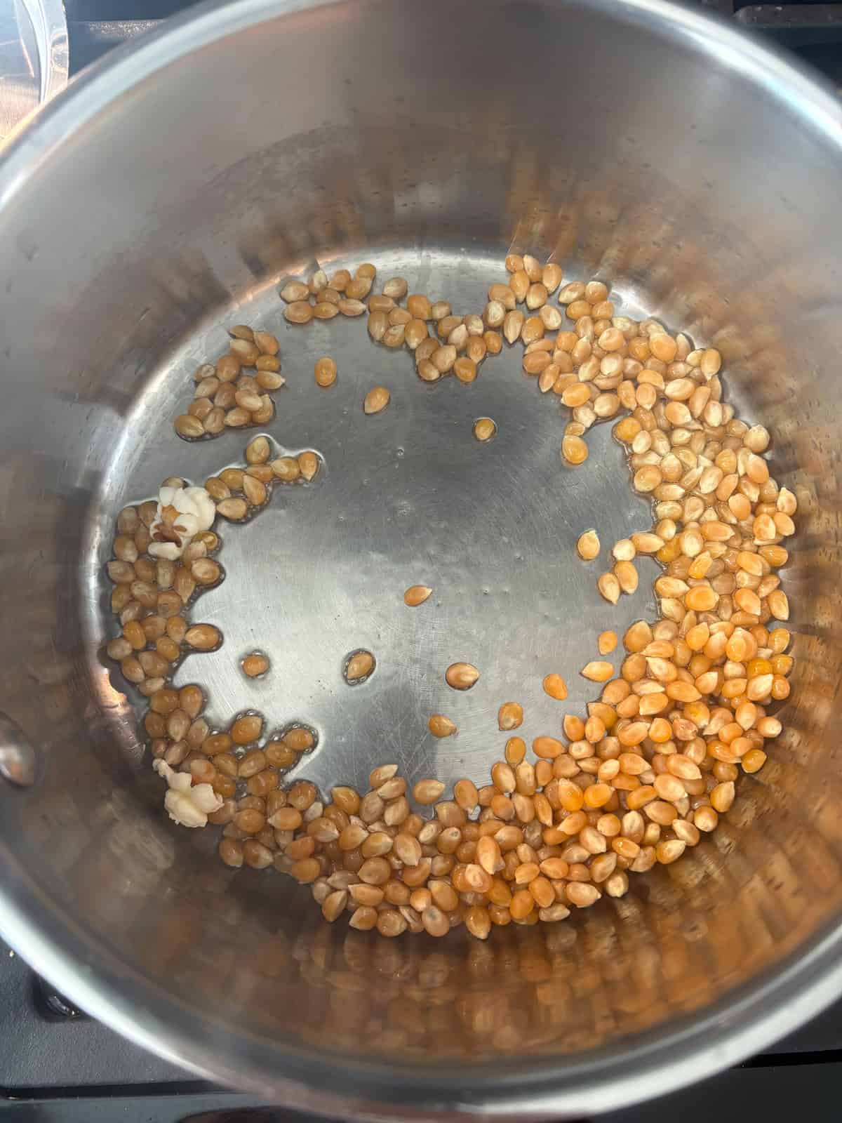 Pot on the stove with the rest of the kernels added.