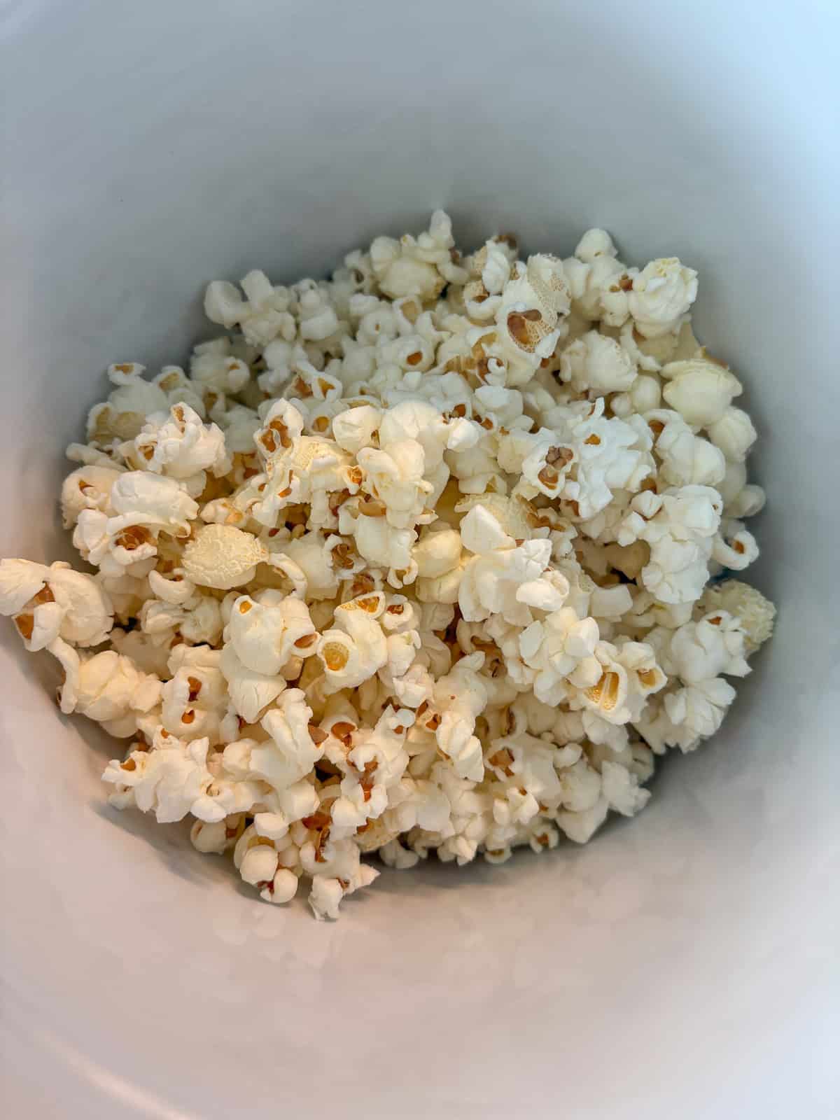 Popcorn transferred to a large bowl.