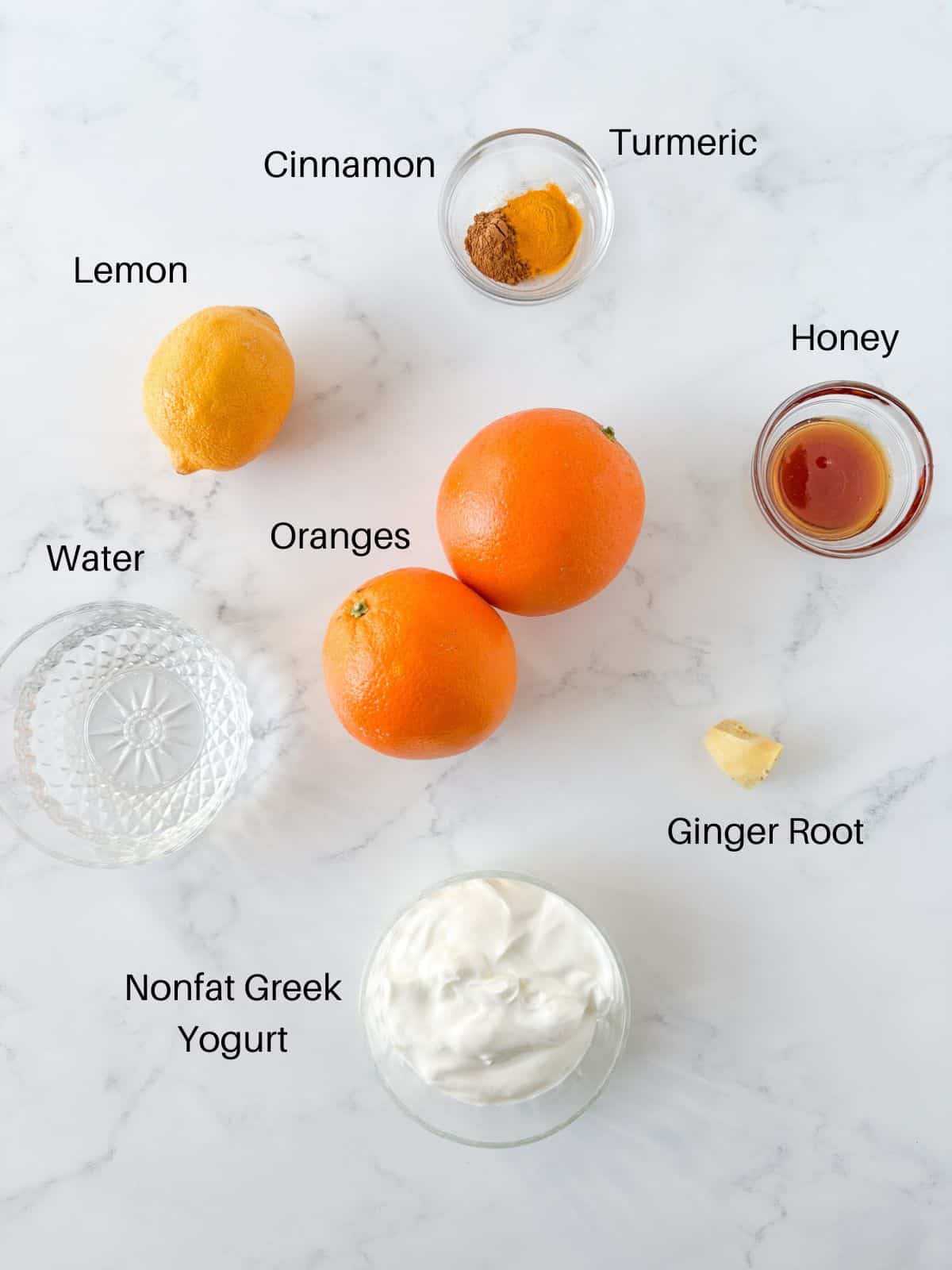 Ingredients for orange ginger immunity drink.