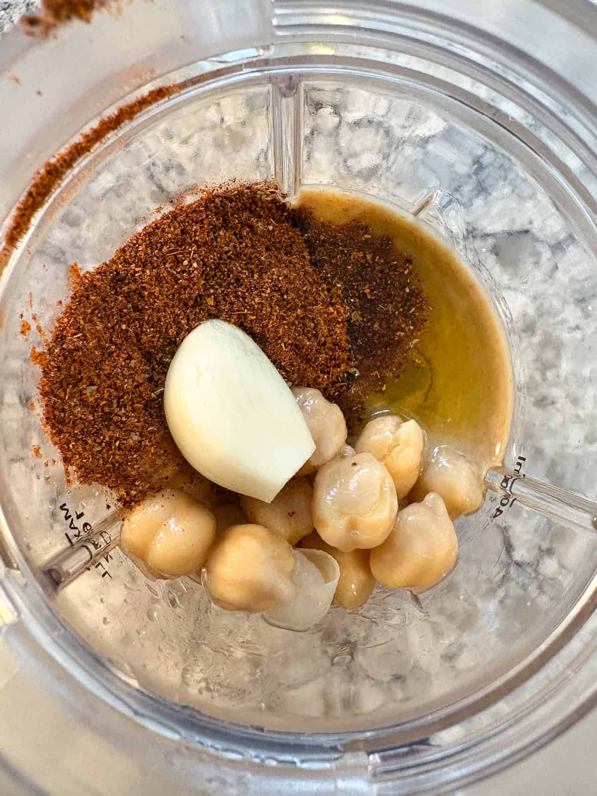All the taco hummus ingredients in the food processor.