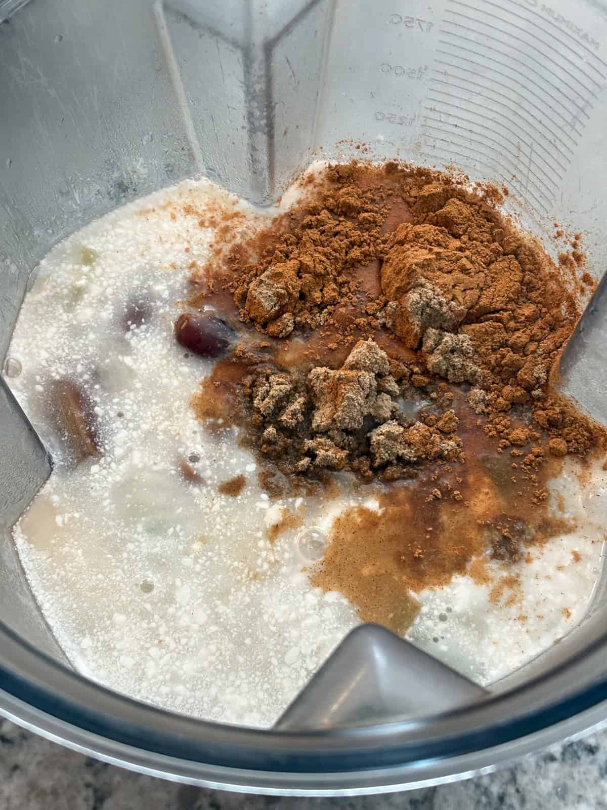 Coconut milk and spices added to the blender.