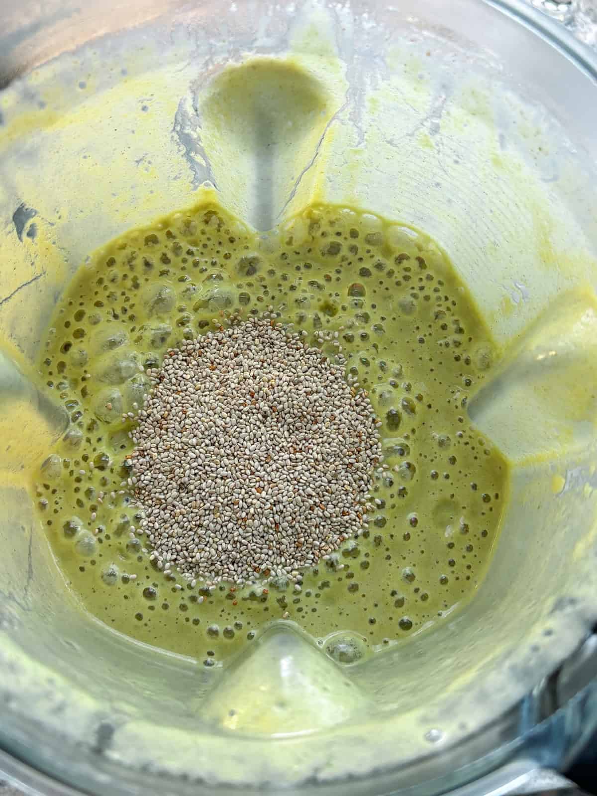 White chia seeds added to blended zucchini mixture.